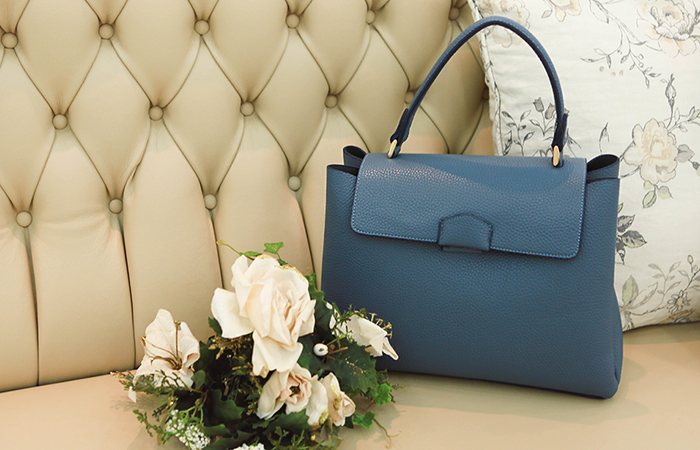 [模特穿29秒成龙广场手提包