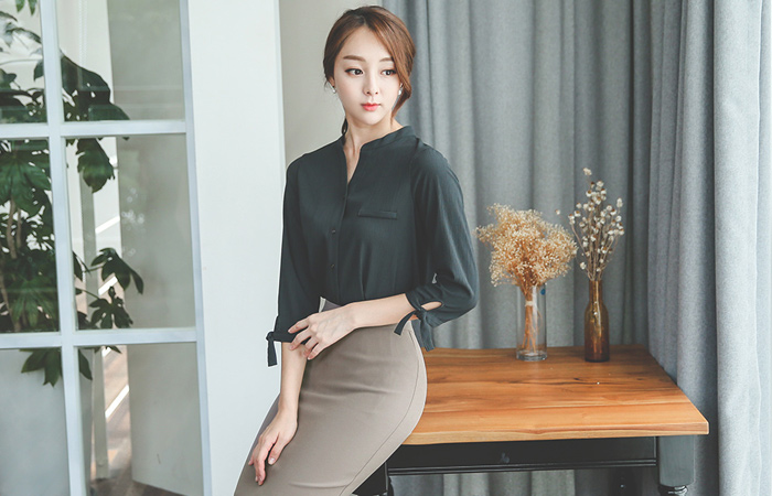 皱纹的纹理蝴蝶结女衬衫