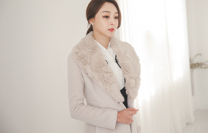 女人真兔毛羊毛大衣