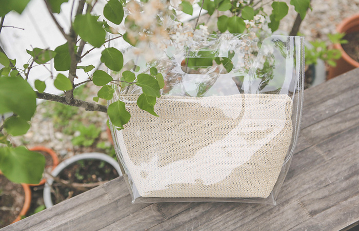 [模特穿37次]时尚 透明海边 手提包(化妆包set)