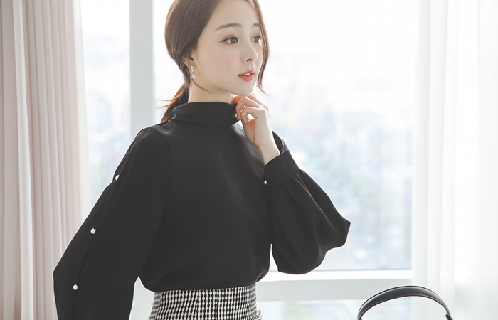 珍珠点缀高龄衬衫