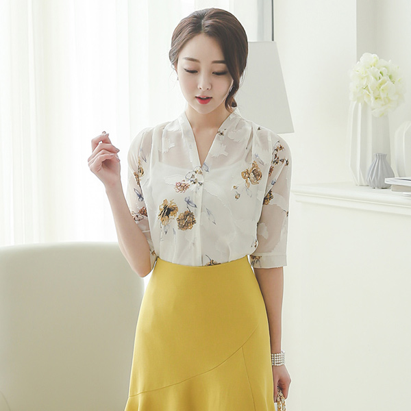 羽毛花透明的女人衬衫