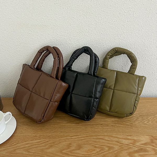 软的 人造皮夹 羽绒服 手提包