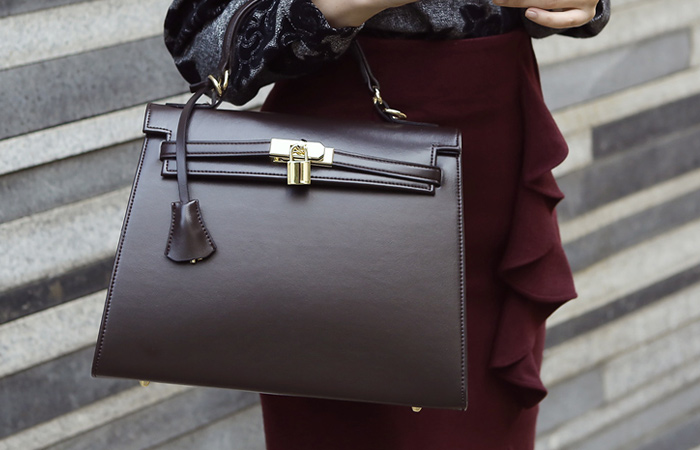 金现代摇滚手提包